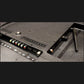 Back view of a television with connectivity ports on a black background
